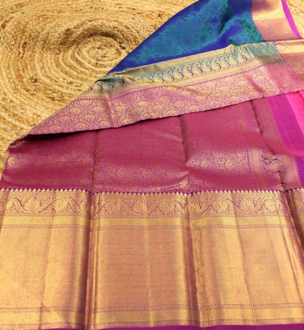 Peacock Green Embossed Zari Border Pure Kanchi Saree