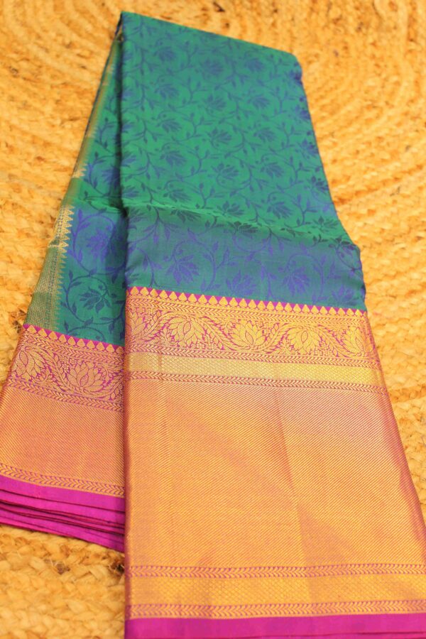 Peacock Green Embossed Zari Border Pure Kanchi Saree - Image 2