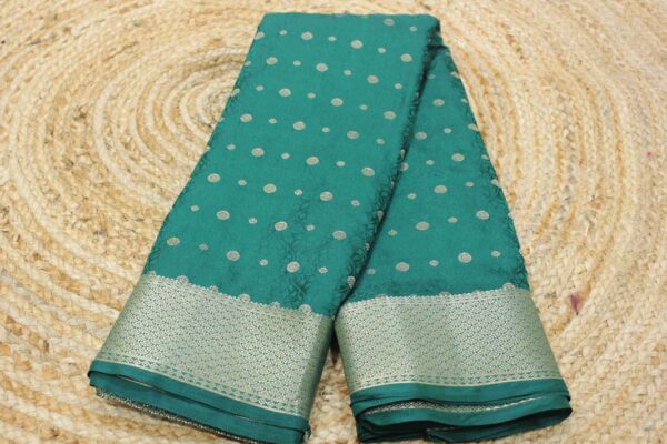 Self Embossed with zari buttas semi silk saree