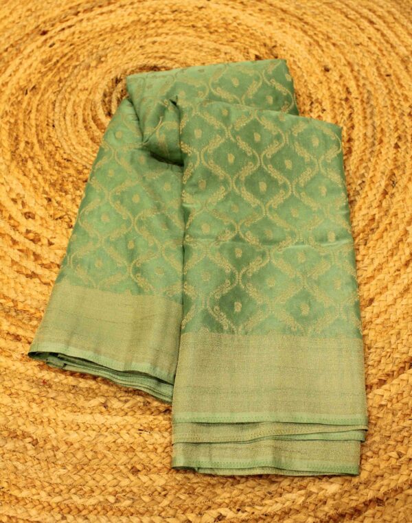 Zari Woven Jaal with Buttas Semi Georgette Saree
