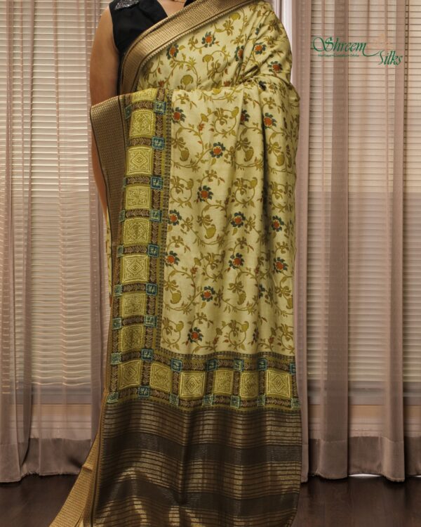 Chickoo & Green Ajrakh Print Semi Dola Saree
