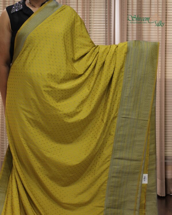 Black Zari Woven Small Buttas with Big Border Semi Banaras Crepe Saree - Image 5