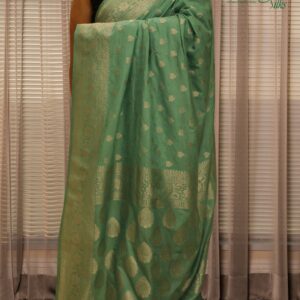 Self Embossed with Silver Zari Woven Motifs Crepe Saree